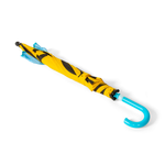 Yellow umbrella with black patterns and a blue handle on a white background