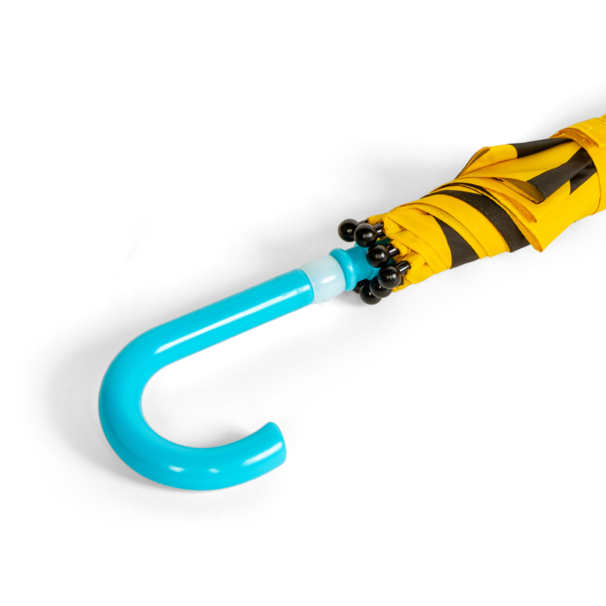 Yellow and black striped umbrella with a blue handle on a white background