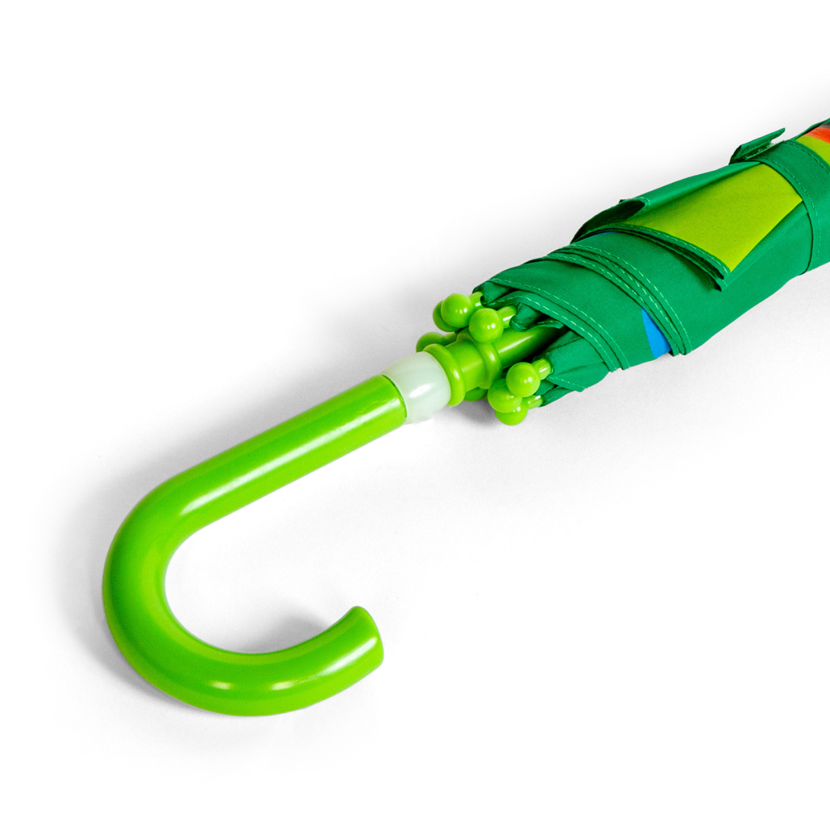 Green umbrella with a unique handle design on a white background